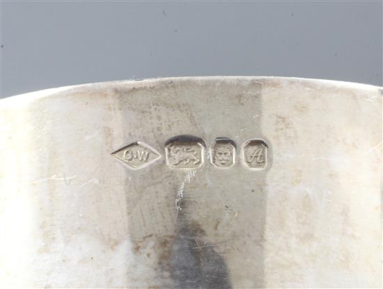 A pair of 1970s silver candle holders and a three piece silver condiment set by Graham Watling of Lacock, gross 17 oz.